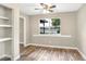 Bright dining room with wood flooring and a view of a lake at 10 Locust Run Crse, Ocala, FL 34472