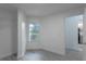Charming bedroom with gray flooring and a view of the backyard at 4548 Summergrove Ave, Orlando, FL 32812