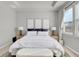 Bright bedroom with king-size bed and stylish decor at 590 Piazza Pt, Oviedo, FL 32765