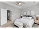 Bright bedroom with king-size bed and stylish decor at 590 Piazza Pt, Oviedo, FL 32765
