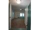 Bright and spacious entryway with carpeted floors at 32525 Oak Park Dr, Leesburg, FL 34748