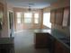 Kitchen features ample counter space and stainless steel appliances at 32525 Oak Park Dr, Leesburg, FL 34748