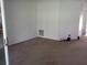 Spacious living room with neutral carpeting at 32525 Oak Park Dr, Leesburg, FL 34748