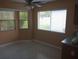 Bright breakfast nook with window and ceiling fan at 32525 Oak Park Dr, Leesburg, FL 34748