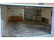 Spacious garage with cabinets and workshop area at 32525 Oak Park Dr, Leesburg, FL 34748