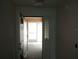 Front entrance with view of a screened porch at 32525 Oak Park Dr, Leesburg, FL 34748