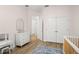 Light and airy bedroom with double doors and closet at 858 Creston Dr, Maitland, FL 32751
