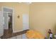Spacious bedroom with hardwood floors and access to another room at 858 Creston Dr, Maitland, FL 32751