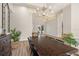 Bright dining room with a large table and chandelier at 858 Creston Dr, Maitland, FL 32751