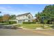 Two-story home with attached garage and manicured lawn at 858 Creston Dr, Maitland, FL 32751