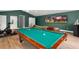 Game room with pool table, exercise bike and large screen TVs at 858 Creston Dr, Maitland, FL 32751