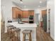 Modern kitchen with light wood cabinets and white countertops at 858 Creston Dr, Maitland, FL 32751
