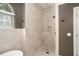 Large walk-in shower with neutral tile and built-in niche at 858 Creston Dr, Maitland, FL 32751