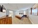 Spacious bedroom with a king-size bed and en-suite bathroom at 4830 Memories Ln, Kissimmee, FL 34746