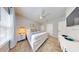 Spacious bedroom with a queen bed and large windows at 4830 Memories Ln, Kissimmee, FL 34746