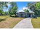 Front view of house with driveway at 544 S Cottage Hill Rd, Orlando, FL 32805