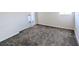 Spacious bedroom with neutral carpeting and ample natural light at 7591 Sunflower Cir, Kissimmee, FL 34747