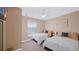 Spacious bedroom with two twin beds and large window at 3174 Feltrim Pl # 201, Kissimmee, FL 34747