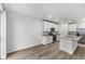 Open kitchen with island and stainless steel appliances at 2130 Judith Ct, Haines City, FL 33844