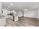 Open concept kitchen with island and stainless steel appliances at 2130 Judith Ct, Haines City, FL 33844