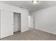 Bright bedroom with carpeted floor and access to another room at 2130 Judith Ct, Haines City, FL 33844