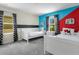 ' bedroom with twin beds and playful decor at 2874 Stanza Ct, Kissimmee, FL 34746
