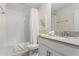 Bathroom with tub, shower, and white vanity at 2874 Stanza Ct, Kissimmee, FL 34746