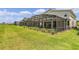 Houses with private screened lanais and grassy backyard at 2874 Stanza Ct, Kissimmee, FL 34746