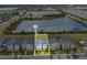 Aerial close-up view of a single house and surrounding homes at 2874 Stanza Ct, Kissimmee, FL 34746