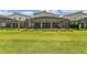 Spacious backyard with multiple homes with lanais and pools at 2874 Stanza Ct, Kissimmee, FL 34746