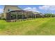 Houses with pools and screened lanais, large grassy yard at 2874 Stanza Ct, Kissimmee, FL 34746