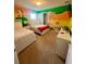 Winnie the Pooh themed bedroom with two twin beds at 2442 Tangier Dr, Kissimmee, FL 34747