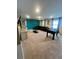 Game room with foosball table and comfortable seating at 2442 Tangier Dr, Kissimmee, FL 34747