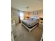 Spacious bedroom with king-size bed and large window at 2442 Tangier Dr, Kissimmee, FL 34747
