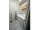 Laundry room with washer, dryer, and shelving at 2442 Tangier Dr, Kissimmee, FL 34747
