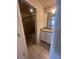 Clean bathroom with white vanity, granite countertop, and shower at 2442 Tangier Dr, Kissimmee, FL 34747