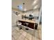 Spacious kitchen with island, granite countertops, and white cabinets at 2442 Tangier Dr, Kissimmee, FL 34747