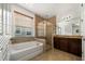 Spa-like bathroom with soaking tub and walk-in shower at 3052 Cardillino Way, Kissimmee, FL 34741