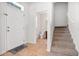 Inviting entryway with tile flooring and half bathroom at 2886 Grasmere View Pkwy, Kissimmee, FL 34746