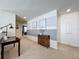 Bright hallway with wood cabinet and carpet flooring at 8914 Zurich Ln, Kissimmee, FL 34747
