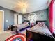 Themed bedroom with twin beds and Marvel decor at 8914 Zurich Ln, Kissimmee, FL 34747