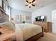 Main bedroom with king bed, TV and ensuite bathroom at 8914 Zurich Ln, Kissimmee, FL 34747