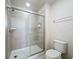 Bathroom with shower and toilet at 8914 Zurich Ln, Kissimmee, FL 34747