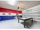 Game room in garage with pool table and game tables at 8914 Zurich Ln, Kissimmee, FL 34747