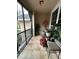 Screened balcony with tiled flooring, ideal for relaxing outdoors at 2045 Erving Cir # 101, Ocoee, FL 34761