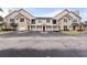 Two story townhome with three-car garage and a spacious driveway at 2045 Erving Cir # 101, Ocoee, FL 34761