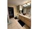 Spacious bathroom with double vanity and large closet at 2045 Erving Cir # 101, Ocoee, FL 34761