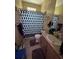 Clean bathroom with shower/tub combo and updated vanity at 2045 Erving Cir # 101, Ocoee, FL 34761