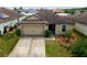 Image 1 of 55: 630 Swallowtail Dr, Haines City