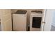 Laundry room with side-by-side Samsung washer and dryer at 5583 Maddie Dr, Haines City, FL 33845